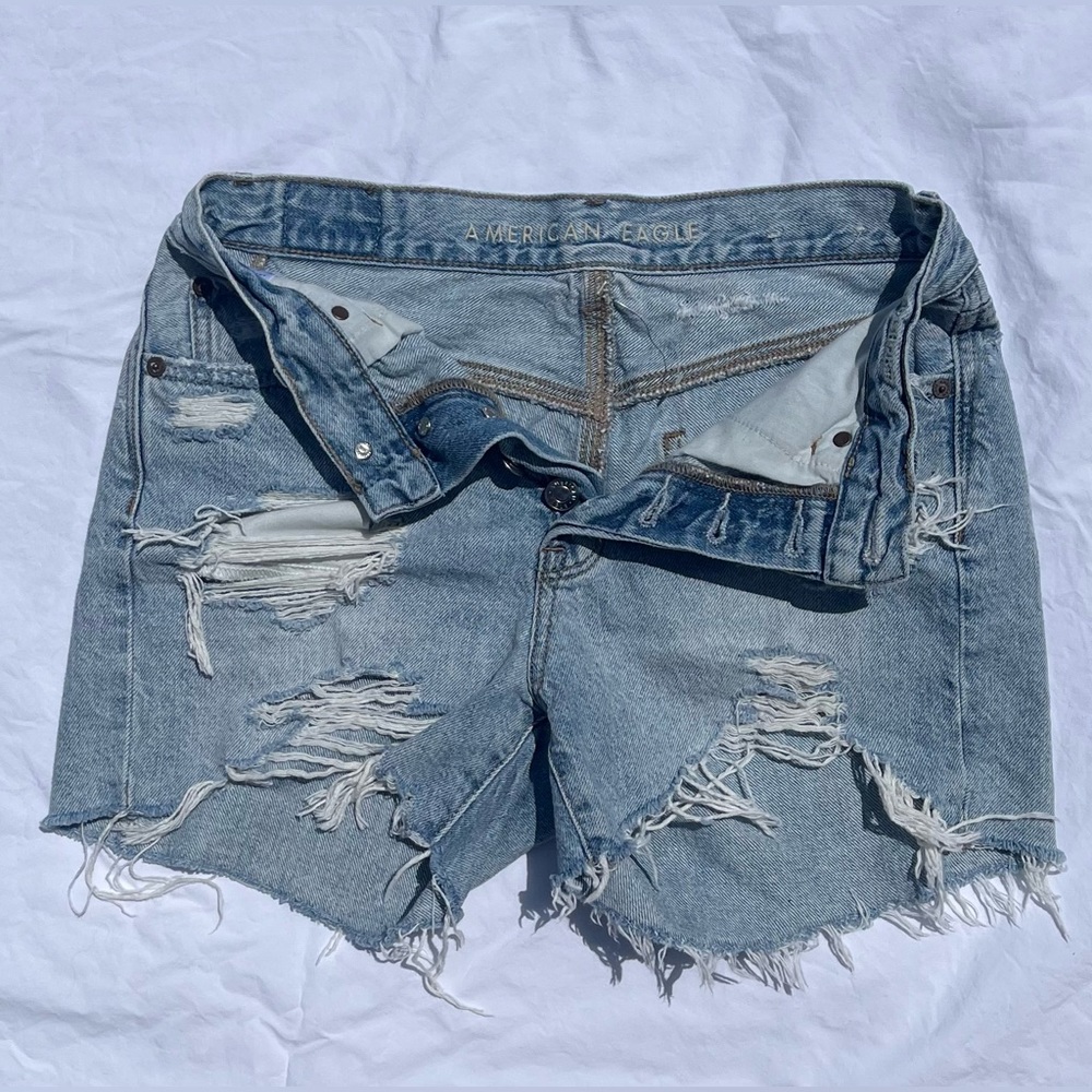 American Eagle Outfitters ripped light wash jean shorts